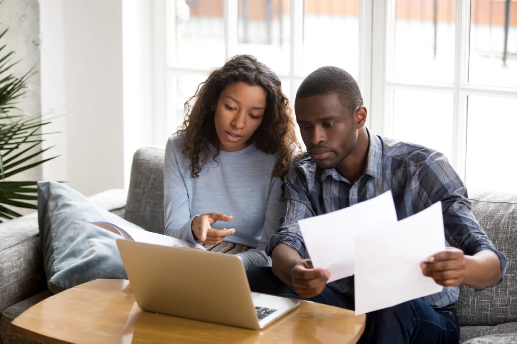 Couple discussing taxes