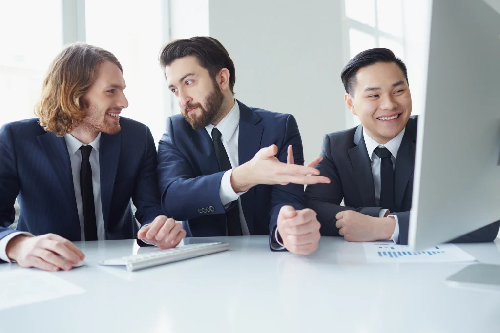 Three men explaining immigration law