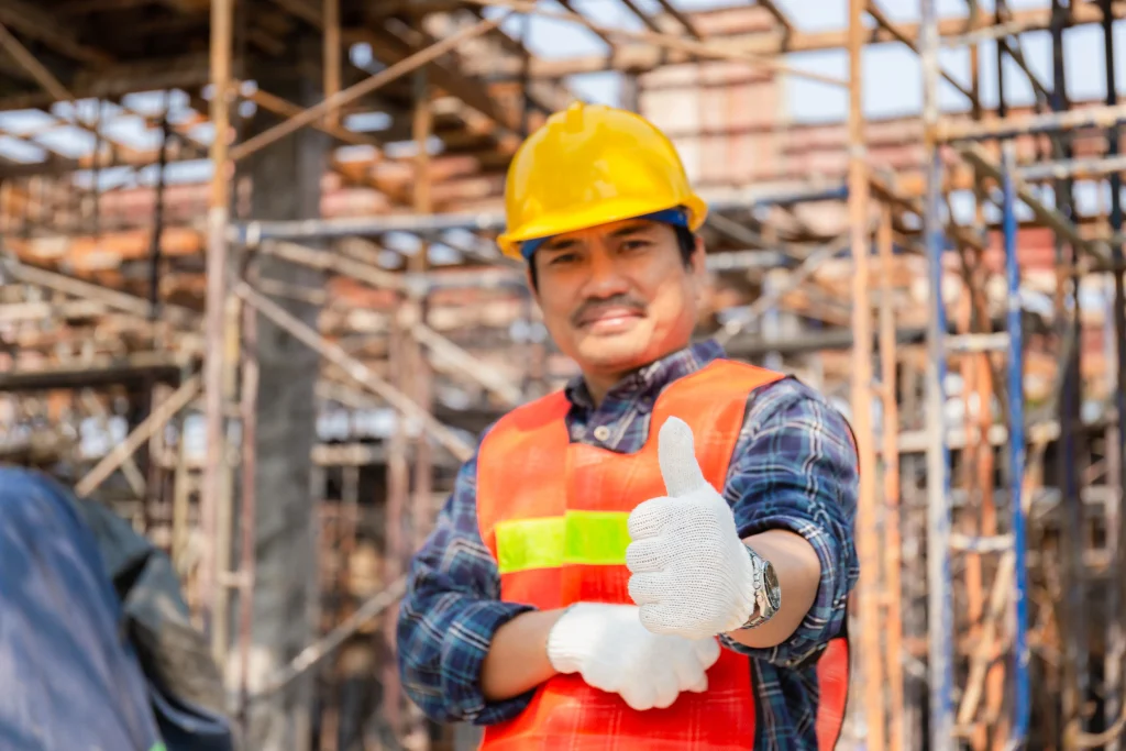 Construction worker giving the thumb up