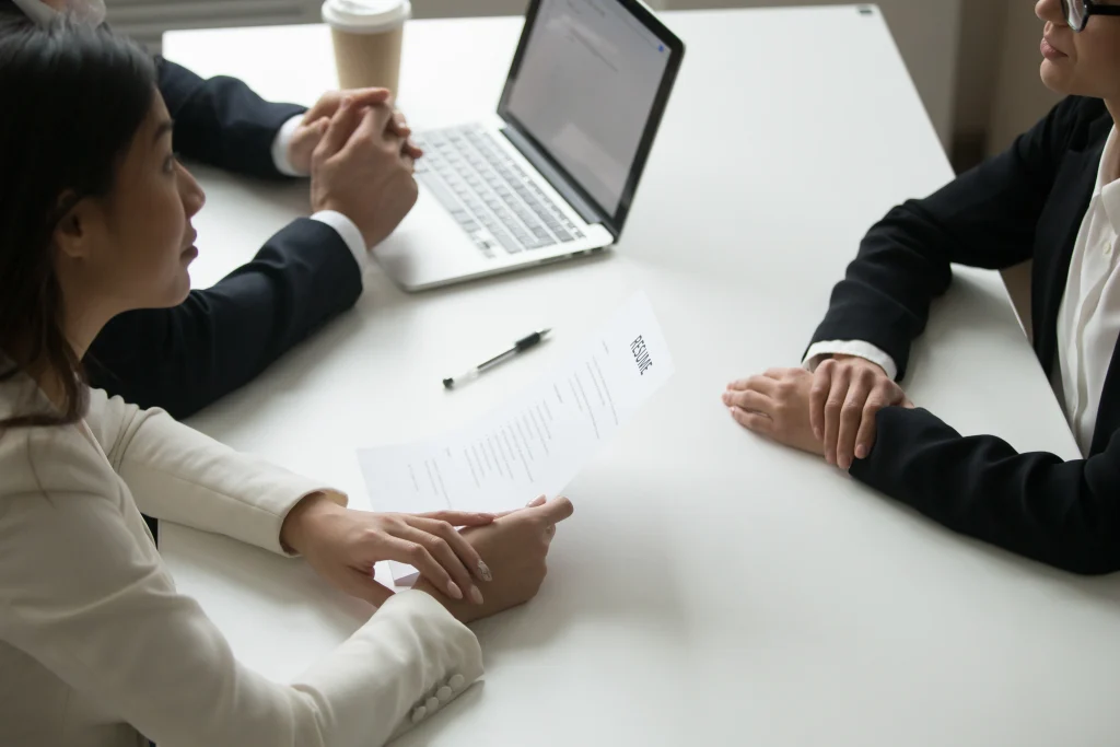 Managers interviewing a job applicant